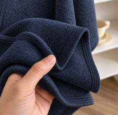 Costura del poncho Lía azul marino