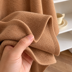 Costura del poncho Lía camel