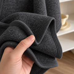 Costura del poncho Lía gris oscuro