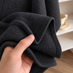 Costura del poncho Lía negro
