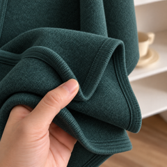 Costura del poncho Lía verde